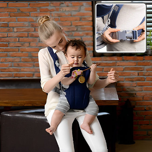 maman assise avec bébé dans porte bébé